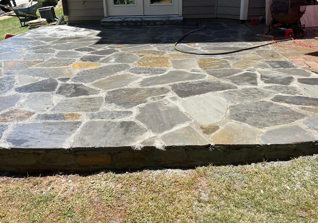 Flagstone patio installed by Moreno Landscaping